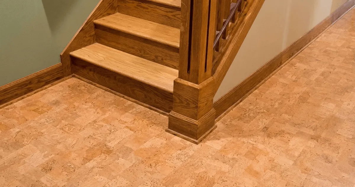 End of a staircase with cork flooring in Minneapolis, MN